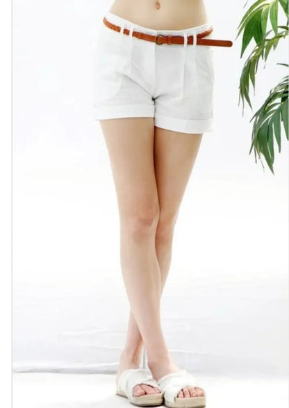 Linen shorts for women featuring side pockets and a twist belt design for added style and functionality. These lightweight short shorts are perfect for casual summer and beachwear, offering breathable fabric that keeps you cool and comfortable in warm weather. Designed for a relaxed fit, they combine practicality and fashion, making them an ideal choice for everyday wear, vacations, or outdoor activities during sunny days.