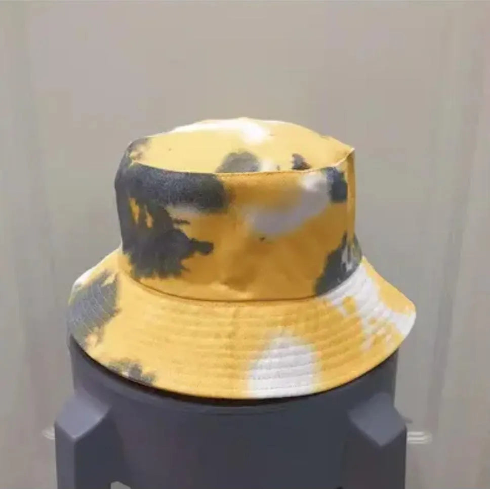 Yellow Gray Tie Dye Bucket Hat for men and women featuring a vibrant, trendy pattern perfect for summer adventures. This unisex fisherman-style sun hat offers lightweight, breathable comfort ideal for travel, beach days, and streetwear fashion. Made from durable materials, it provides excellent sun protection while adding a stylish, casual touch to any outfit. Versatile and fashionable, this hat is a must-have accessory for outdoor activities and everyday wear.