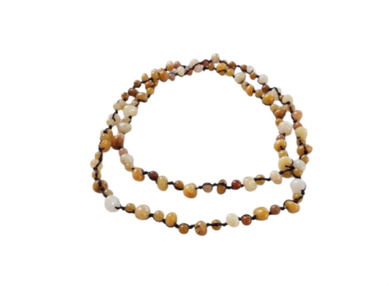 Yellow Jade Beaded Necklace featuring long strands of vibrant yellow jade stones, crafted into a vintage-inspired handmade statement necklace. This bold accessory blends classic elegance with artisanal craftsmanship, perfect for women who love unique, eye-catching jewelry. Ideal gift for special occasions or everyday wear, adding warmth and color to any outfit. A timeless, handcrafted piece that complements both casual and formal styles with boho-chic flair.