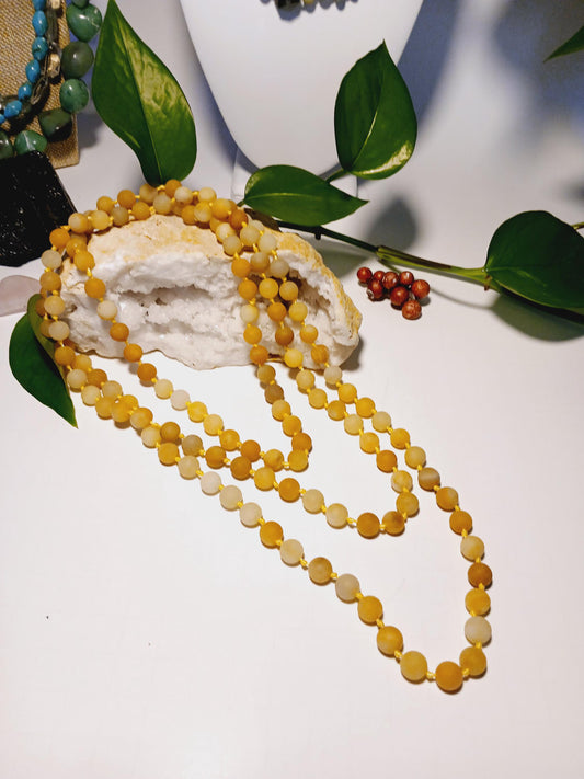 Yellow Jade Long Necklace featuring handmade beaded crystal design crafted from natural stones, perfect for women who love elegant statement jewelry. This artisan piece showcases the warm glow of yellow jade, known for joy and abundance, making it a thoughtful gift for her. Lightweight and eye-catching, it adds a touch of sophistication and spiritual energy to any outfit. Ideal for everyday wear, special occasions, or as a unique addition to a gemstone jewelry collection.