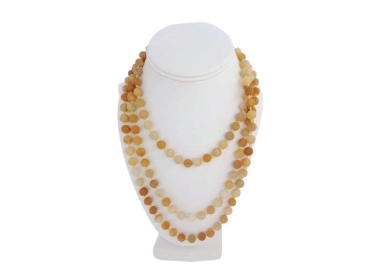 Yellow Jade Long Necklace featuring handmade beaded crystal design crafted from natural stones, perfect for women who love elegant statement jewelry. This artisan piece showcases the warm glow of yellow jade, known for joy and abundance, making it a thoughtful gift for her. Lightweight and eye-catching, it adds a touch of sophistication and spiritual energy to any outfit. Ideal for everyday wear, special occasions, or as a unique addition to a gemstone jewelry collection.