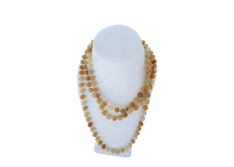 Yellow Jade Long Necklace featuring handmade beaded crystal design crafted from natural stones, perfect for women who love elegant statement jewelry. This artisan piece showcases the warm glow of yellow jade, known for joy and abundance, making it a thoughtful gift for her. Lightweight and eye-catching, it adds a touch of sophistication and spiritual energy to any outfit. Ideal for everyday wear, special occasions, or as a unique addition to a gemstone jewelry collection.