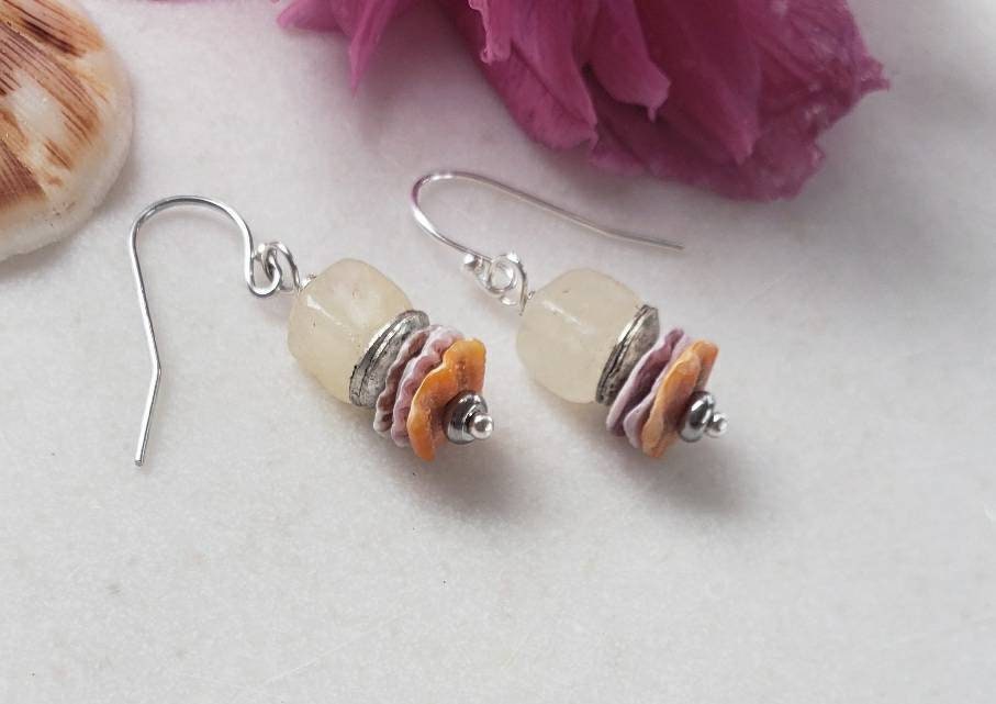 Yellow Minimalist Morganite Earrings featuring 8mm pectin scallop shell design set in sterling silver, perfect for women who love delicate summer jewelry. These dainty earrings add a soft pop of color and elegant charm to any outfit, ideal for casual wear or special occasions. Lightweight and stylish, they make a thoughtful gift for birthdays, anniversaries, or seasonal celebrations. A beautiful blend of natural inspiration and minimalist fashion.